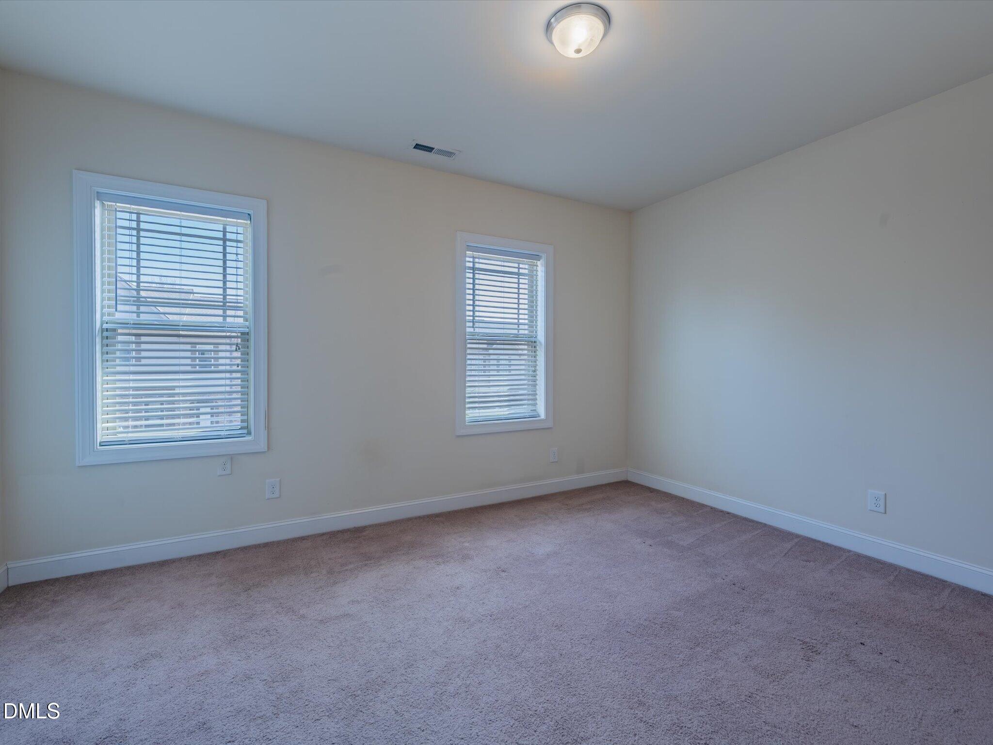 2808 Piedmont River Way Raleigh, NC 27606 - Photo 24 of 28 an empty room with a window