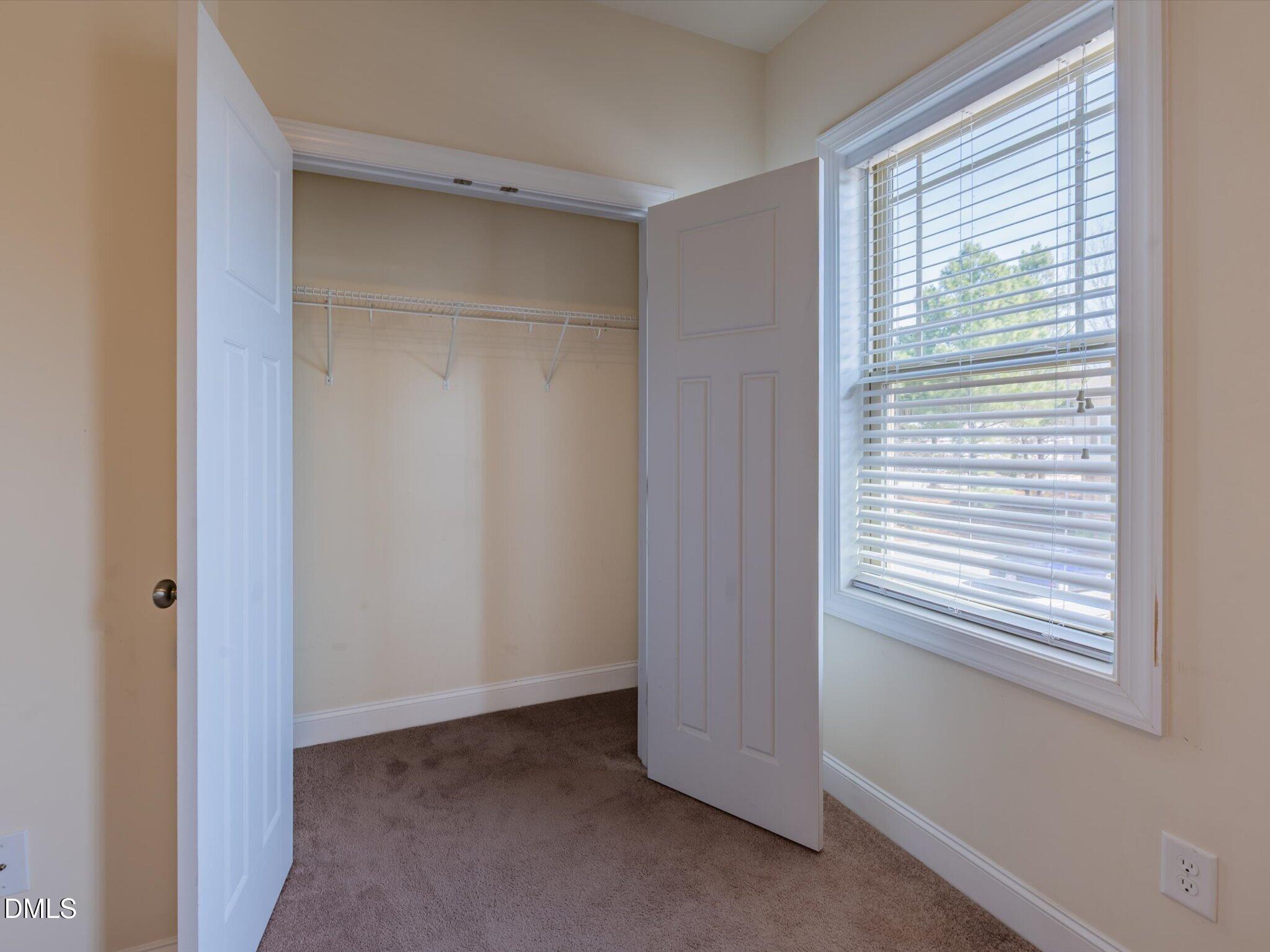 2808 Piedmont River Way Raleigh, NC 27606 - Photo 27 of 28 a view of an empty room with a window
