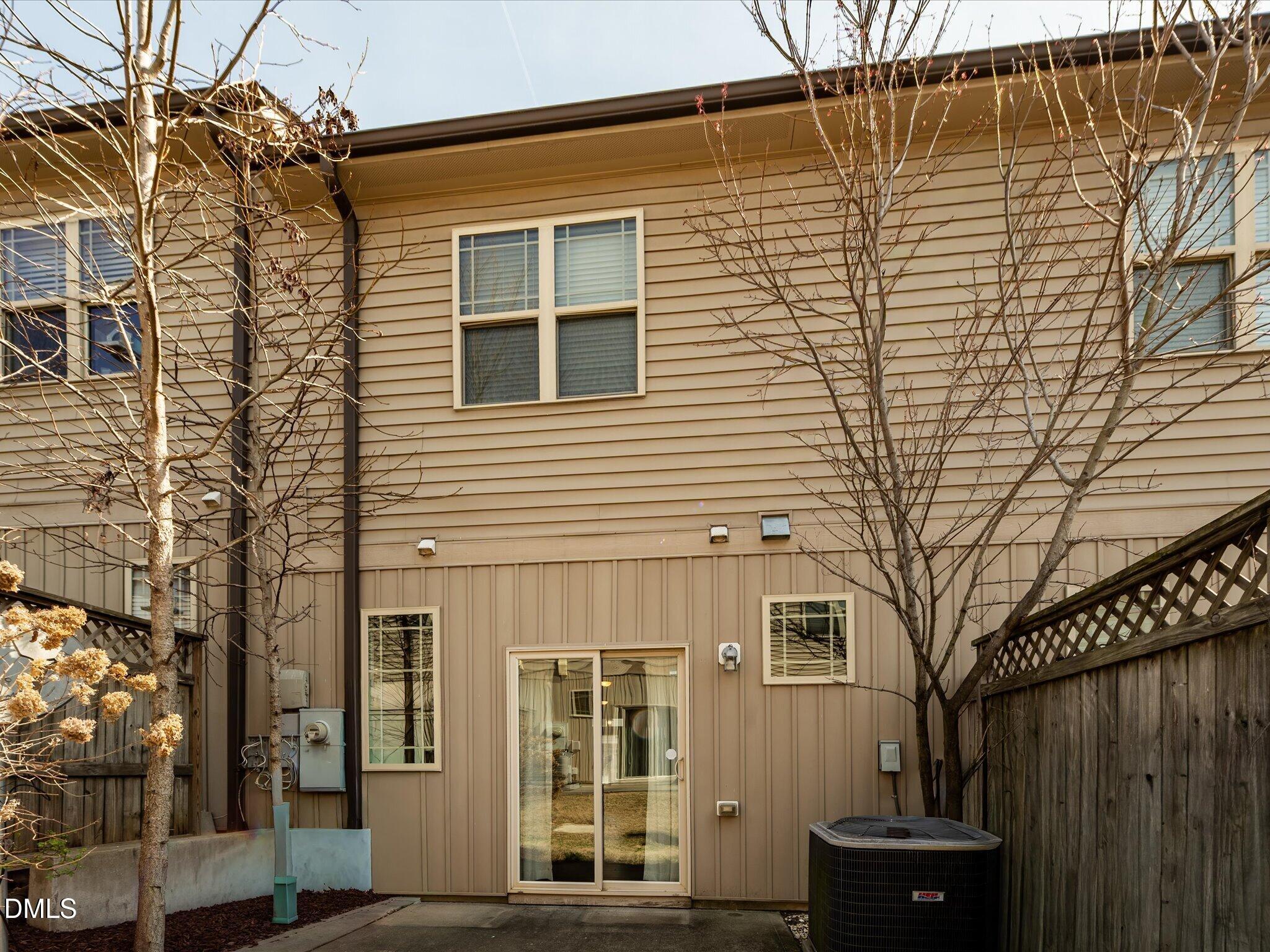 2808 Piedmont River Way Raleigh, NC 27606 - Photo 28 of 28 a front view of a house with a glass windows