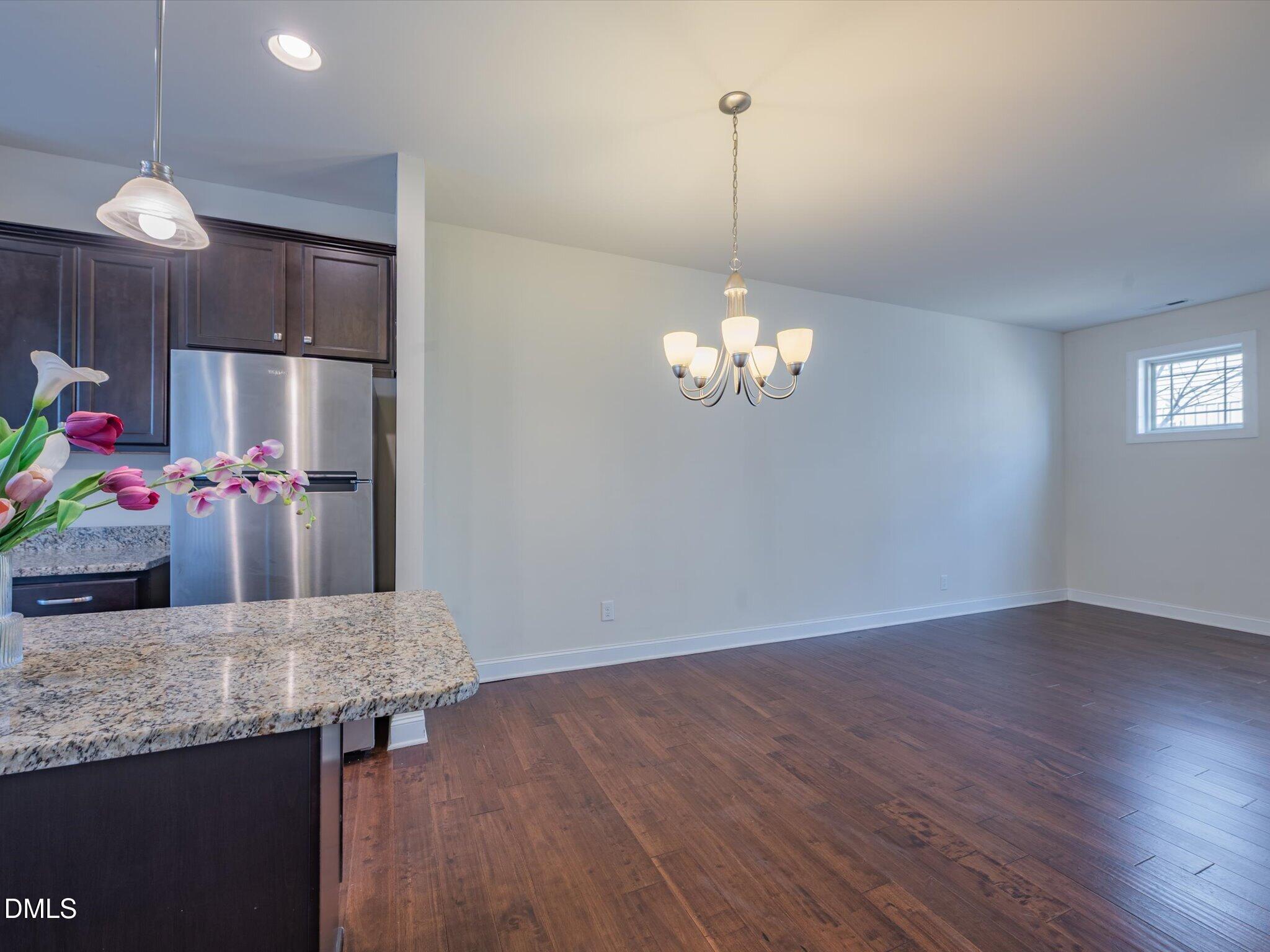 2808 Piedmont River Way Raleigh, NC 27606 - Photo 10 of 28 a view of a kitchen and chandelier