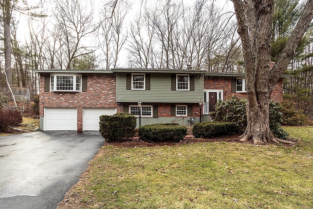10 Marina Road Chelmsford, MA 01824 - Photo 29 of 30 a front view of a house with a yard