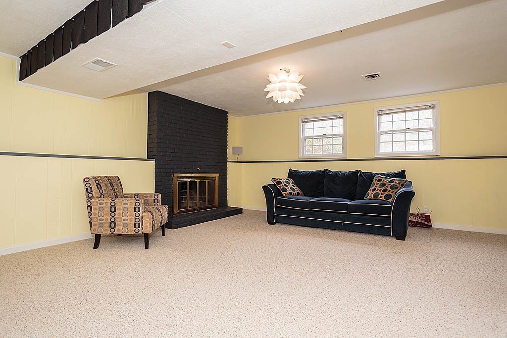 10 Marina Road Chelmsford, MA 01824 - Photo 8 of 30 a view of a livingroom with furniture and a couch