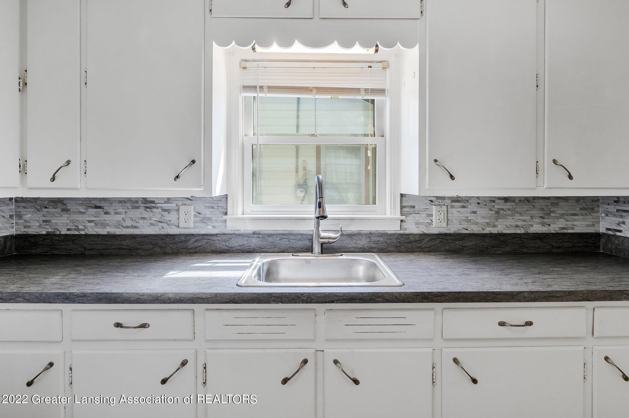 707 West Holmes Road Lansing, MI 48910 - Photo 6 of 23 707-W-Holmes-Rd-WindowStill-Real-Estate-