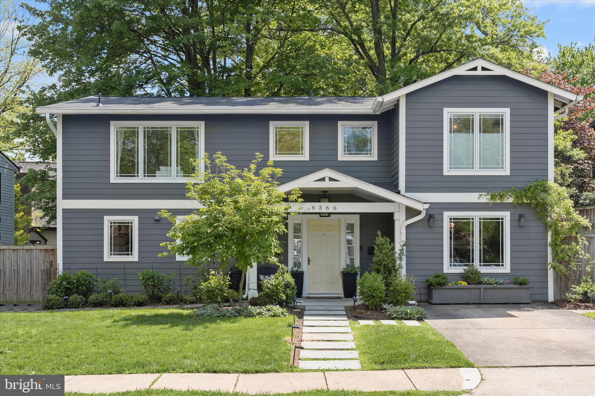 6366 11th Road North Arlington, VA 22205 - Photo 1 of 39 a front view of a house with a yard