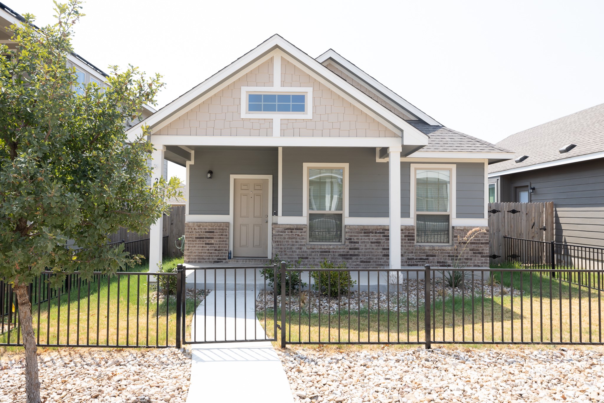 2809 Seneca Path, Unit 30 Leander, TX 78641 - Photo 2 of 30 a front view of a house with a balcony