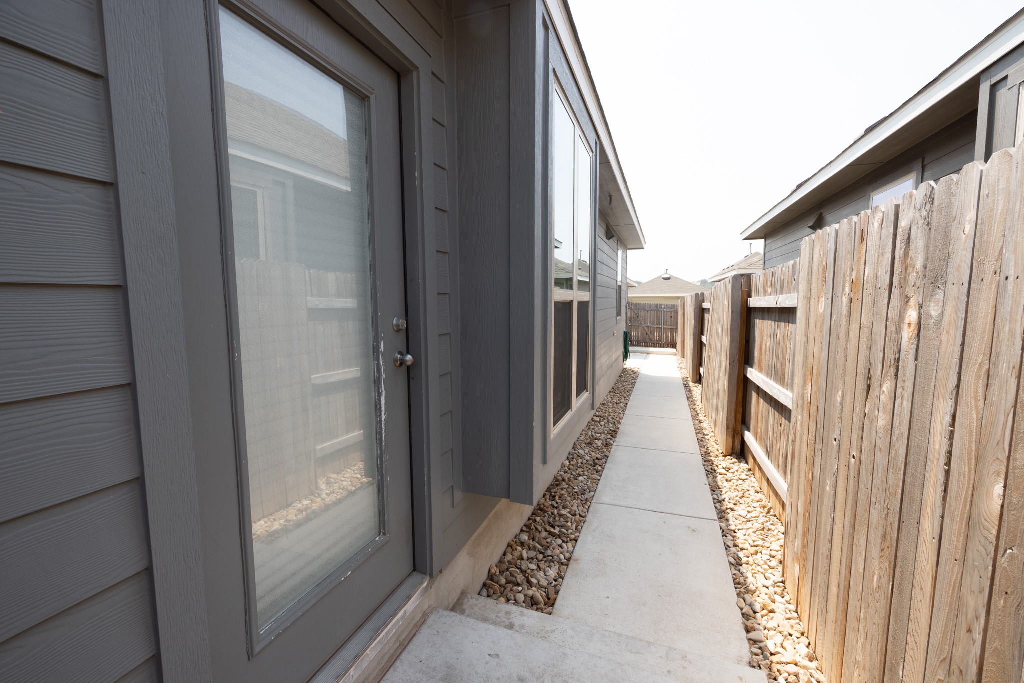 2809 Seneca Path, Unit 30 Leander, TX 78641 - Photo 26 of 30 a view of a narrow alley