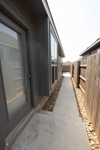 a path view of a house with stairs