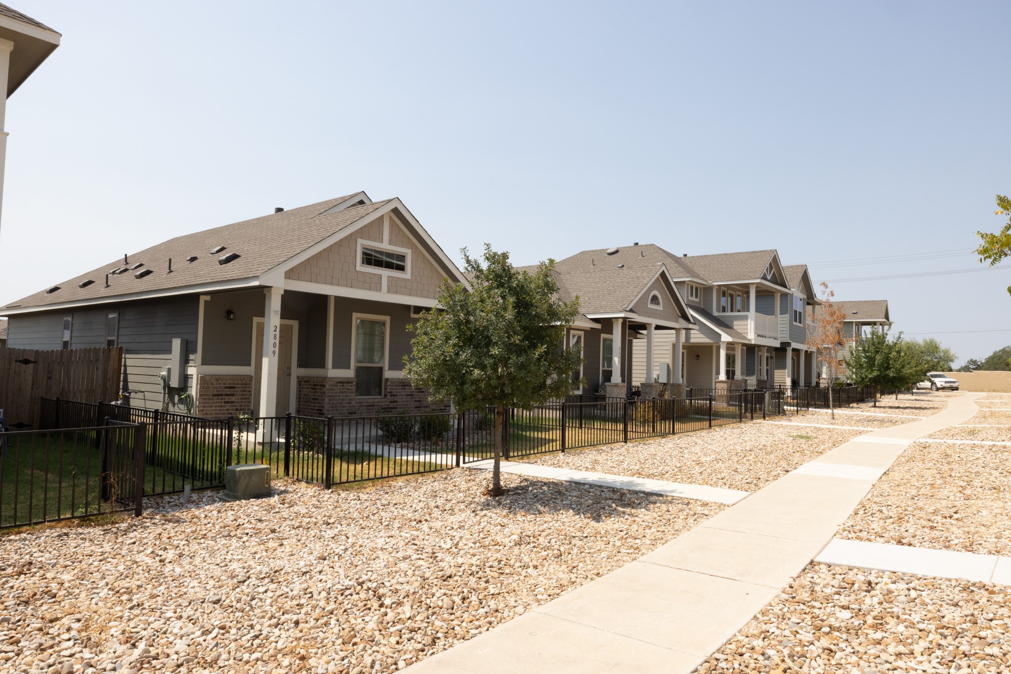 2809 Seneca Path, Unit 30 Leander, TX 78641 - Photo 5 of 30 a front view of a house with a yard