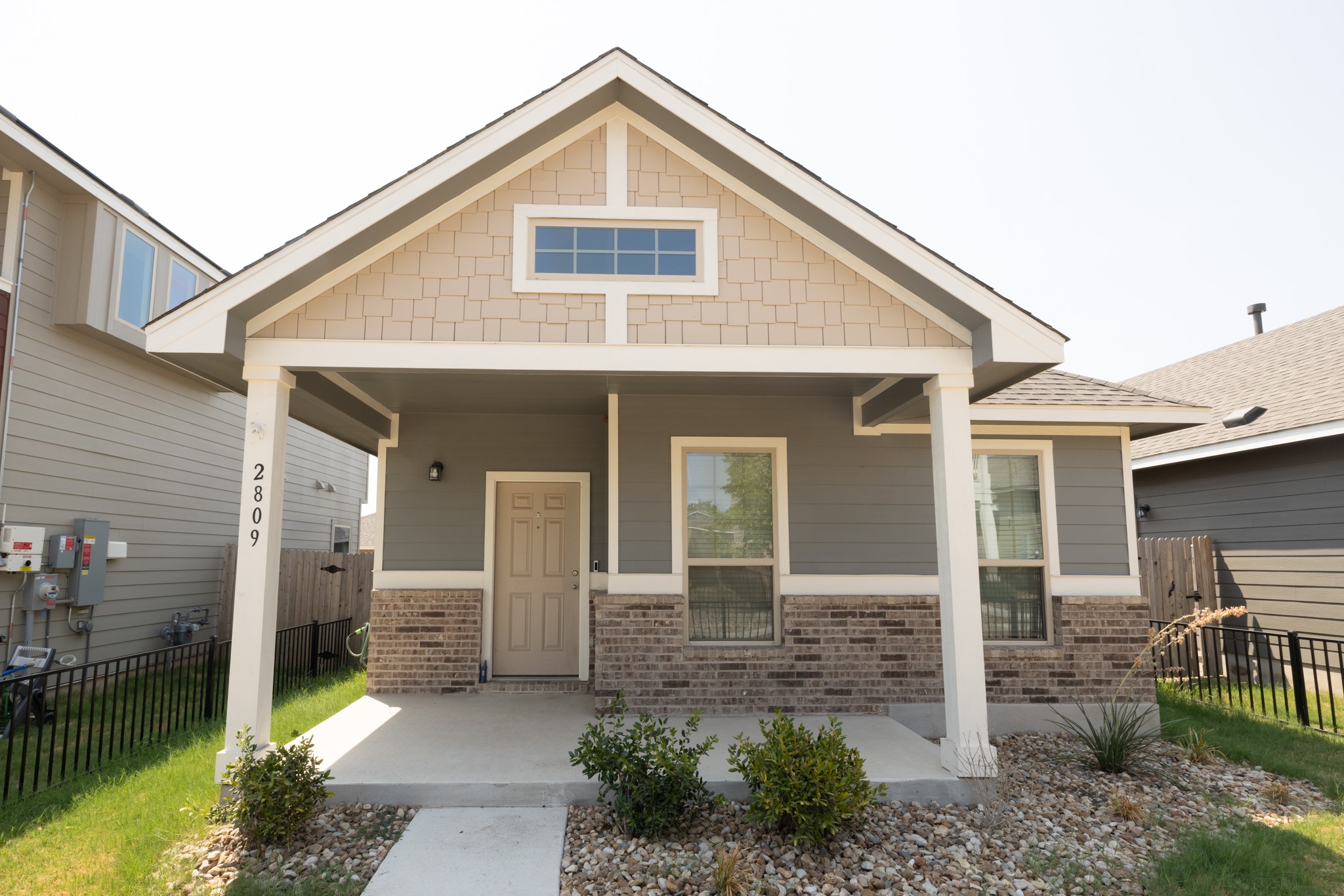 2809 Seneca Path, Unit 30 Leander, TX 78641 - Photo 6 of 30 a front view of a house with a yard