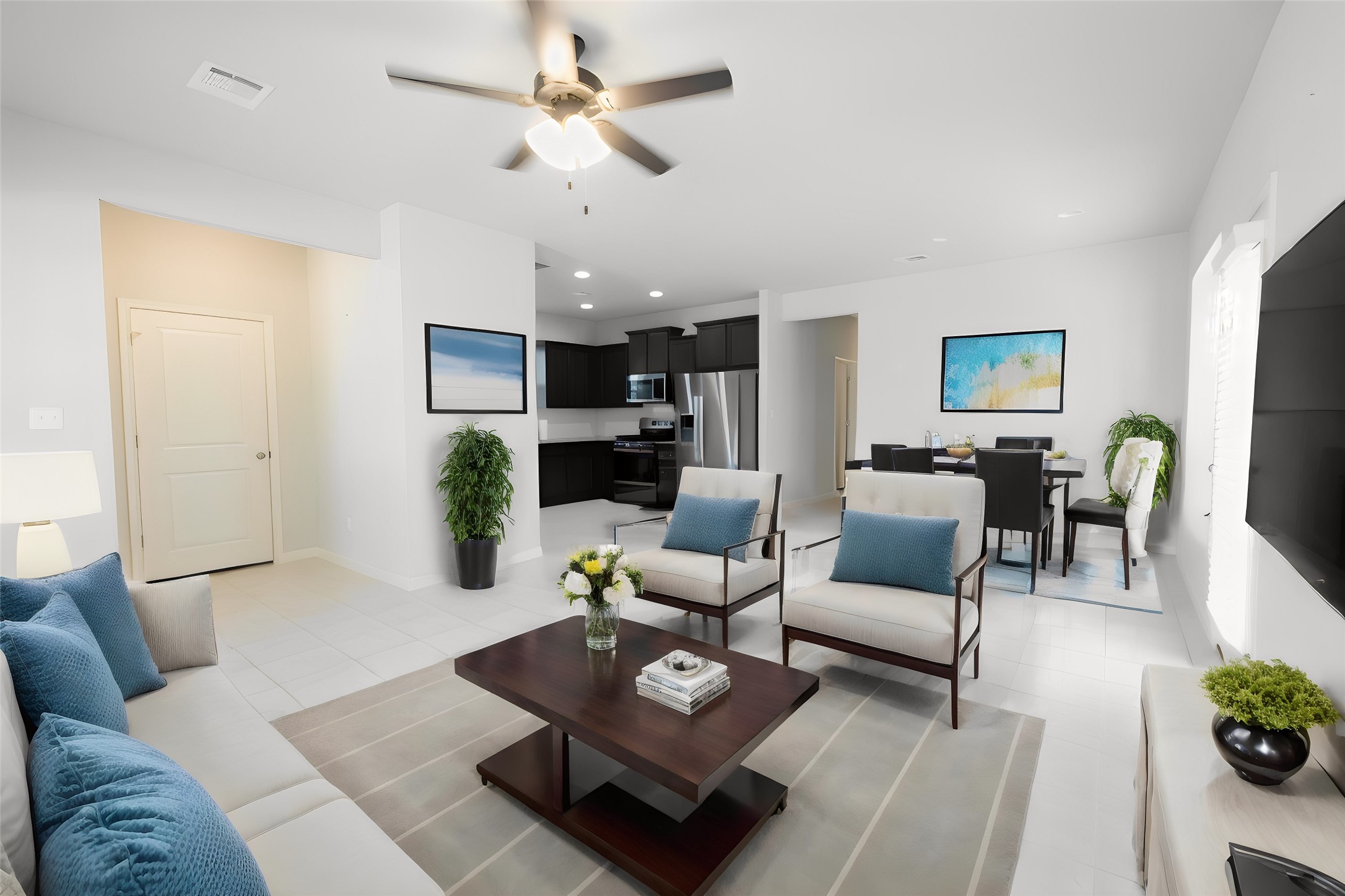 2809 Seneca Path, Unit 30 Leander, TX 78641 - Photo 9 of 30 a living room with furniture a fireplace and a chandelier