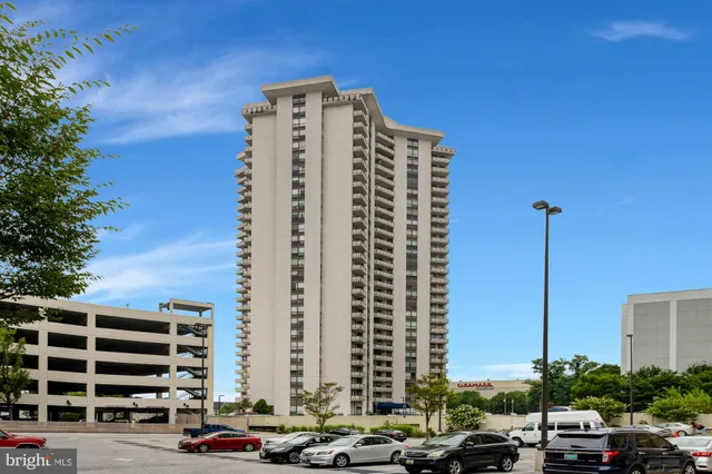 a view of a building with a street