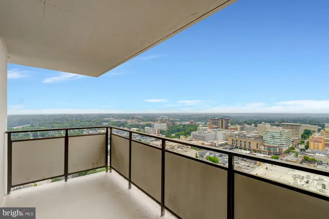 a view of a balcony with an ocean view