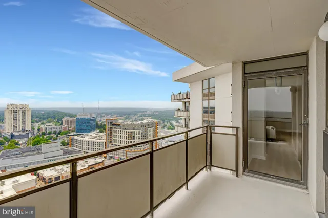 a view of a balcony with city view