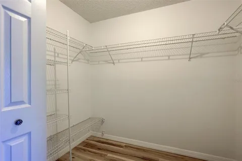 a view of a room with racks on the wall