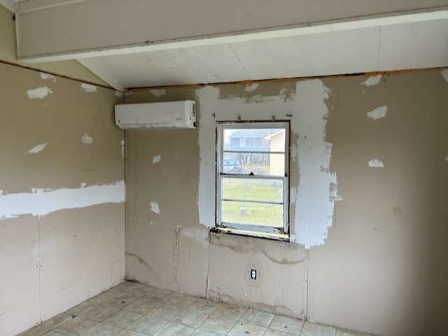 6708 Hawthorne Road Hitchcock, TX 77563 - Photo 3 of 9 a bathroom with a window and mirror