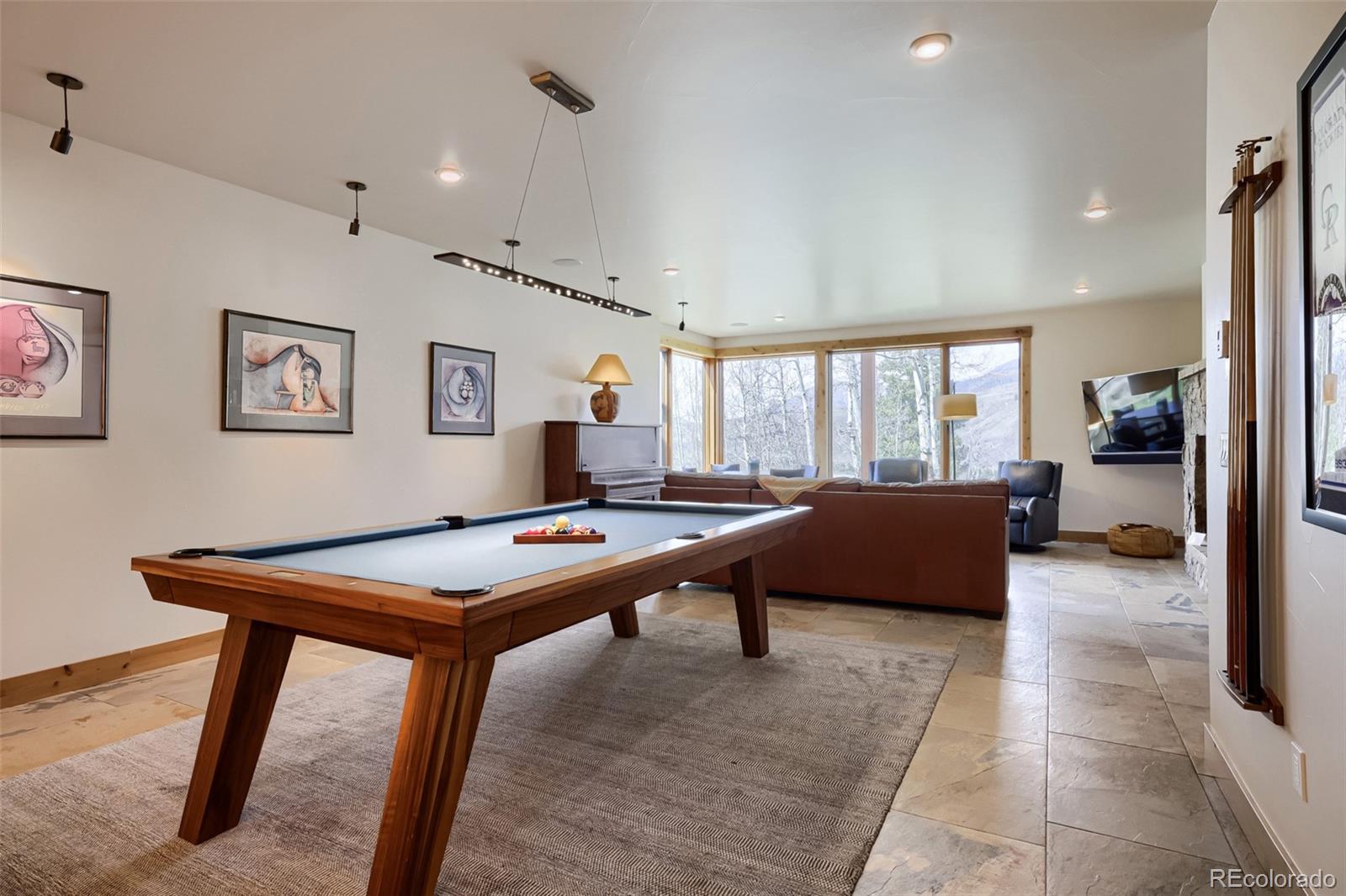 836 Maryland Creek Road Silverthorne, CO 80498 - Photo 18 of 49 a room with furniture pool table and windows