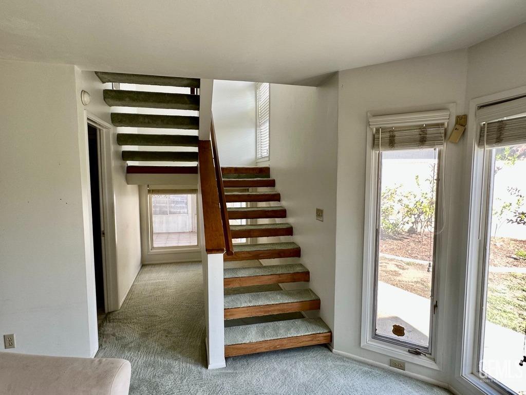 Undisclosed Address Bakersfield, CA 93306 - Photo 21 of 34 a view of entryway with stairs and wooden floor