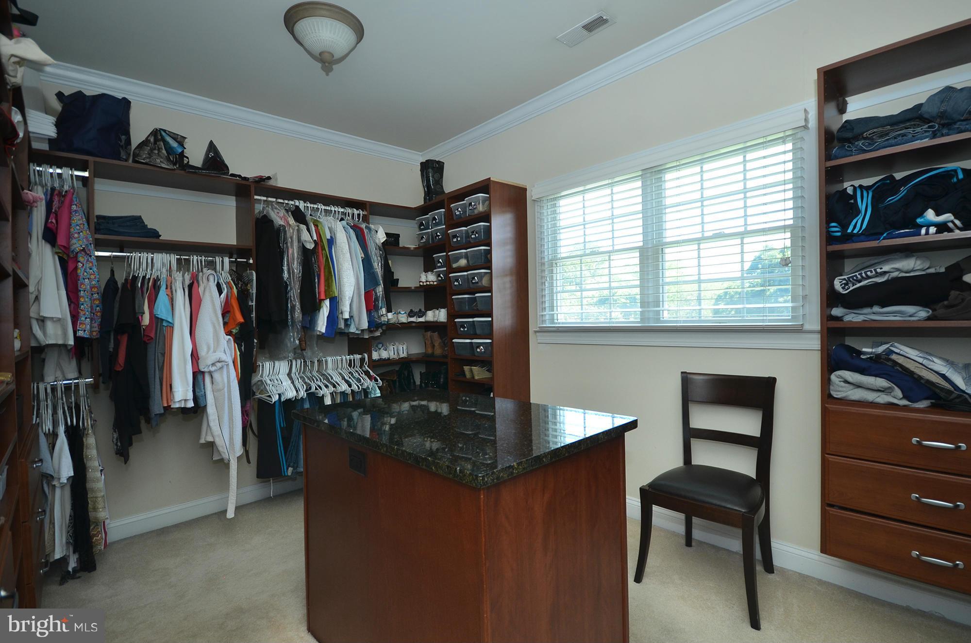 3401 Meredith Ridge Road Phoenix, MD 21131 - Photo 16 of 28 a view of walk in closet with clothes