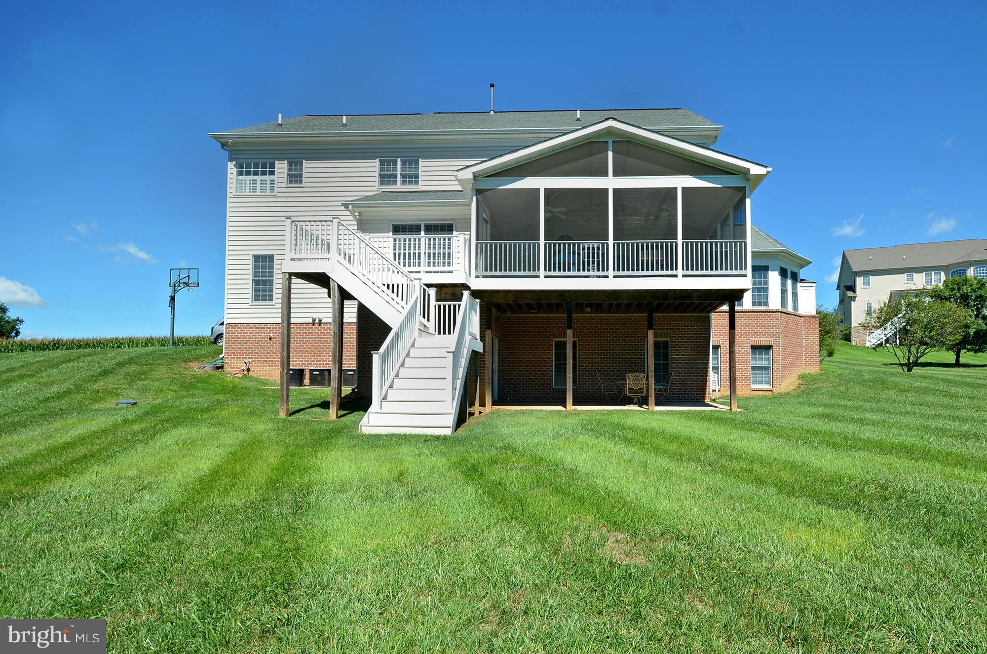 3401 Meredith Ridge Road Phoenix, MD 21131 - Photo 27 of 28 a front view of a house with a yard
