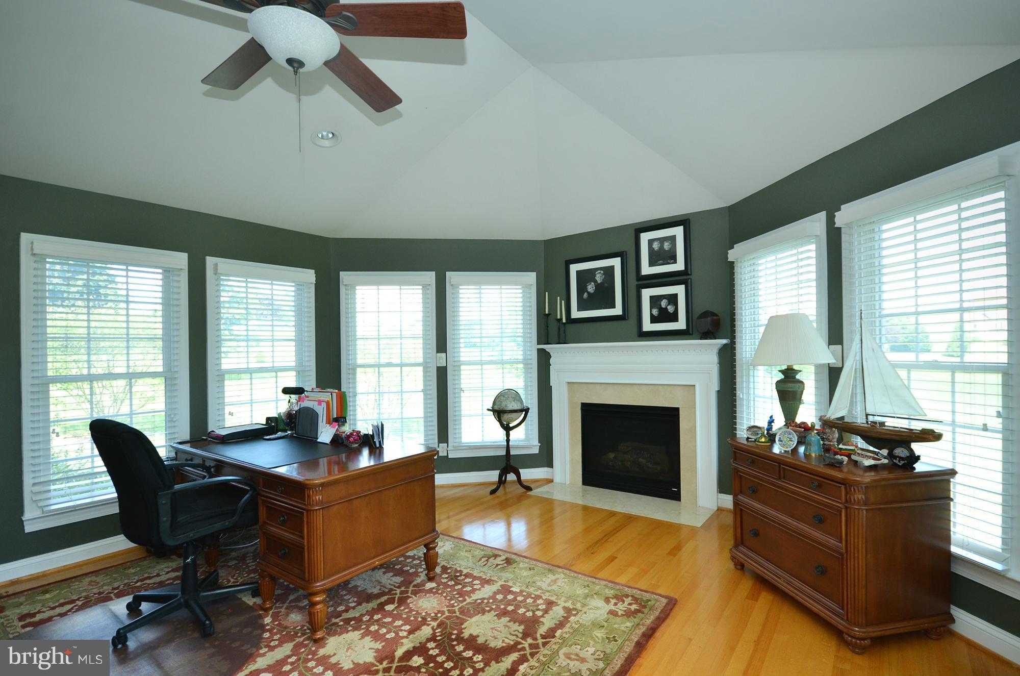 3401 Meredith Ridge Road Phoenix, MD 21131 - Photo 10 of 28 a living room with furniture fireplace and window