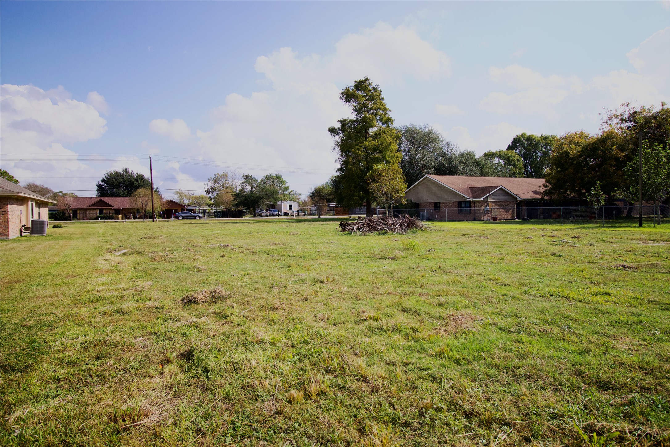 10307 Sralla Road Crosby, TX 77532 - Photo 2 of 5 a view of a swimming pool with an outdoor seating and a garden