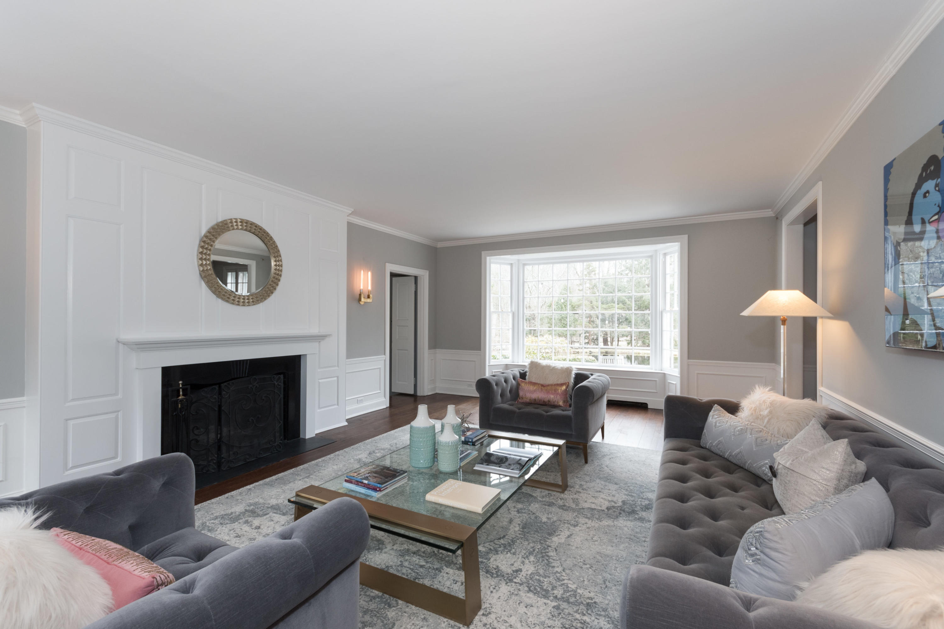 95 Half Mile Road Darien, CT 06820 - Photo 12 of 36 a living room with furniture and a fireplace