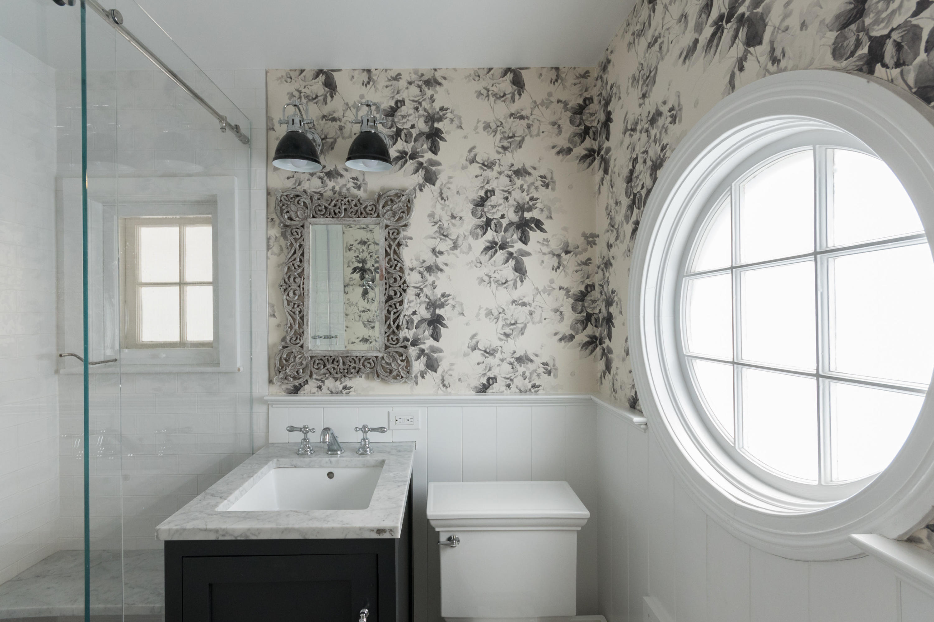 95 Half Mile Road Darien, CT 06820 - Photo 23 of 36 a bathroom with a sink and a mirror