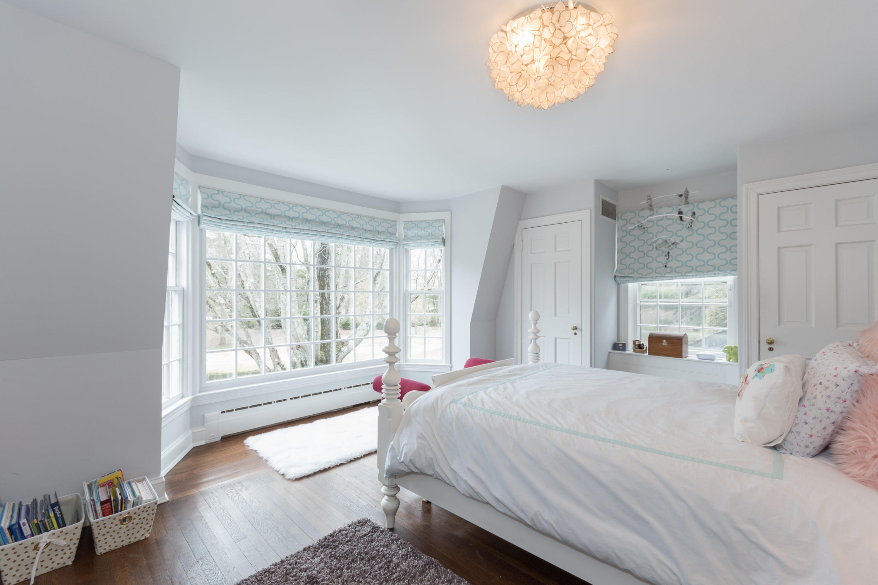 95 Half Mile Road Darien, CT 06820 - Photo 27 of 36 a bedroom with a large bed and a window