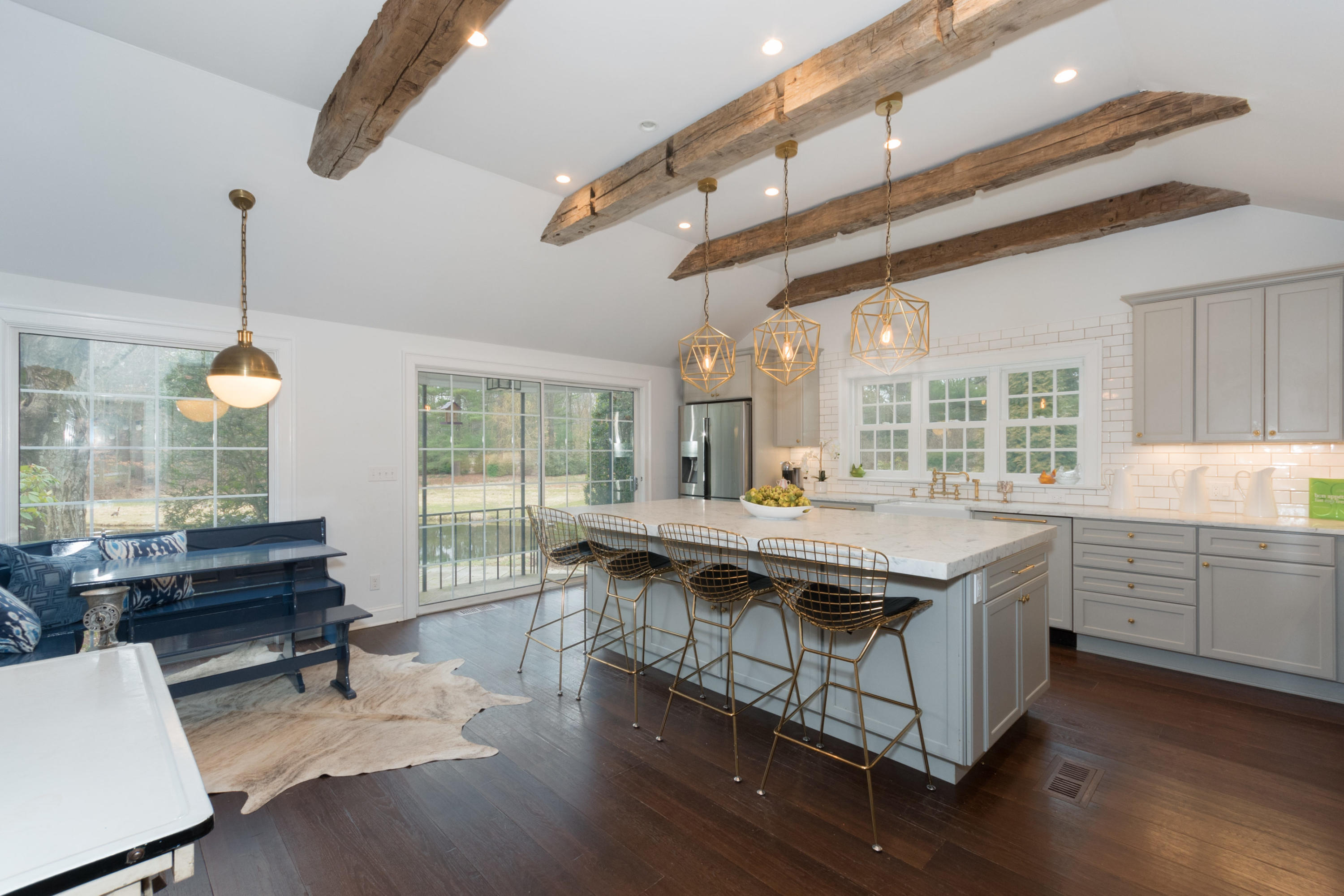 95 Half Mile Road Darien, CT 06820 - Photo 7 of 36 a kitchen with sink stove and wooden floor