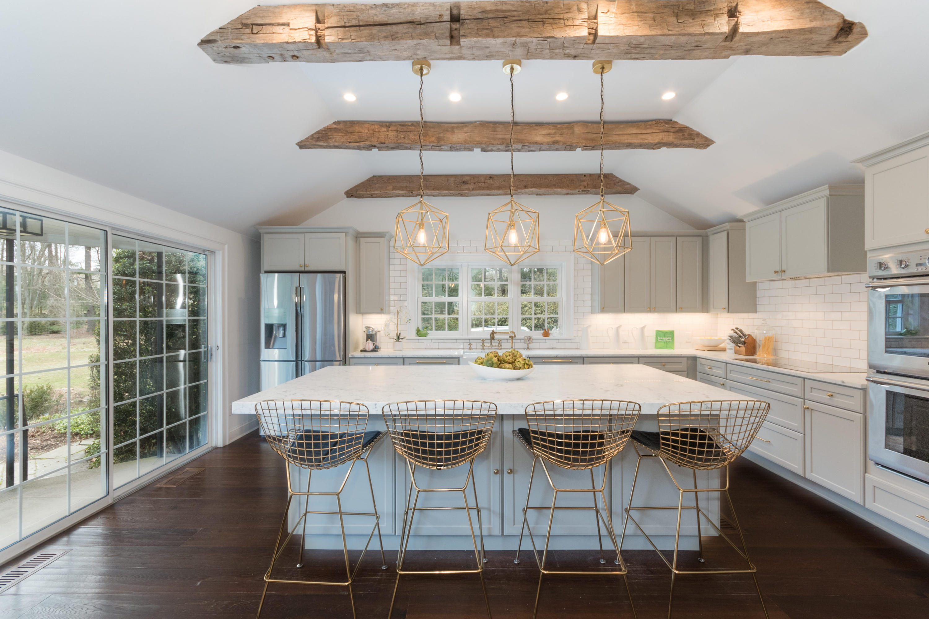 95 Half Mile Road Darien, CT 06820 - Photo 8 of 36 a view of a dining room with furniture wooden floor and chandelier