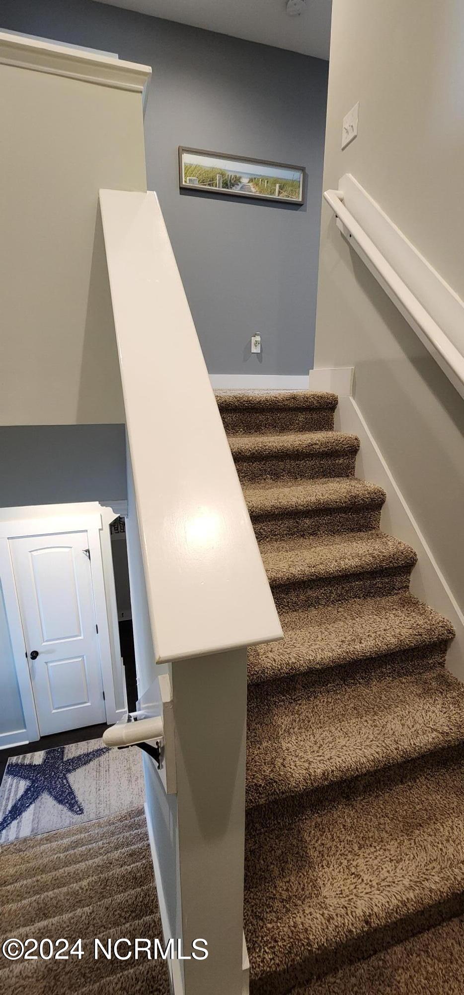 352 Inverness Drive Hubert, NC 28539 - Photo 43 of 51 352 inverness headed down stairs