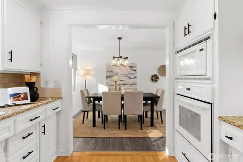 a view of a workspace with furniture