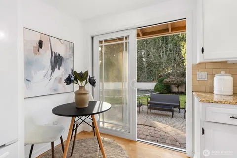 a view of a hallway with washer and dryer