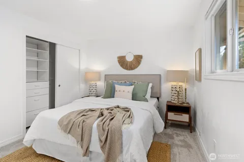 a view of a patio with a table and chairs