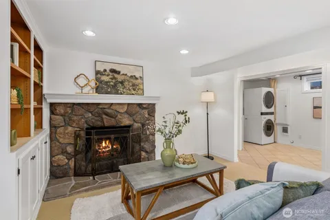 a view of a patio with table and chairs and potted plants