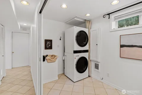 a view of a swimming pool with an outdoor seating