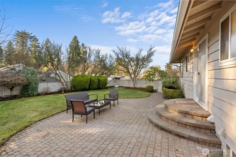 a view of swimming pool with a yard