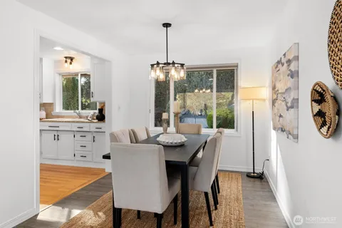 a bathroom with a shower and sink