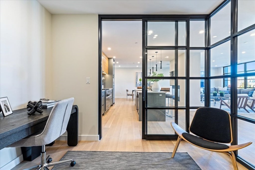 76 Wareham Street, Unit 5C Boston, MA 02118 - Photo 7 of 29 a view of a workspace with furniture and a window
