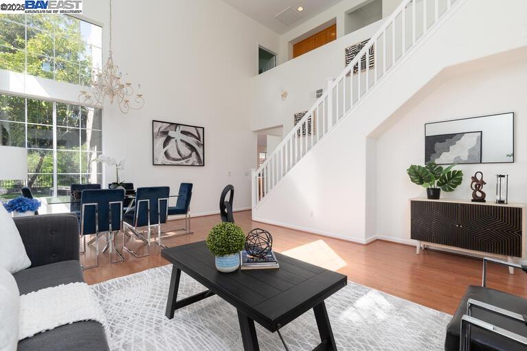 220 Bridgehead Lane Hayward, CA 94544 - Photo 1 of 1 a living room with furniture and wooden floor