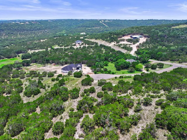 a view of a city with mountain
