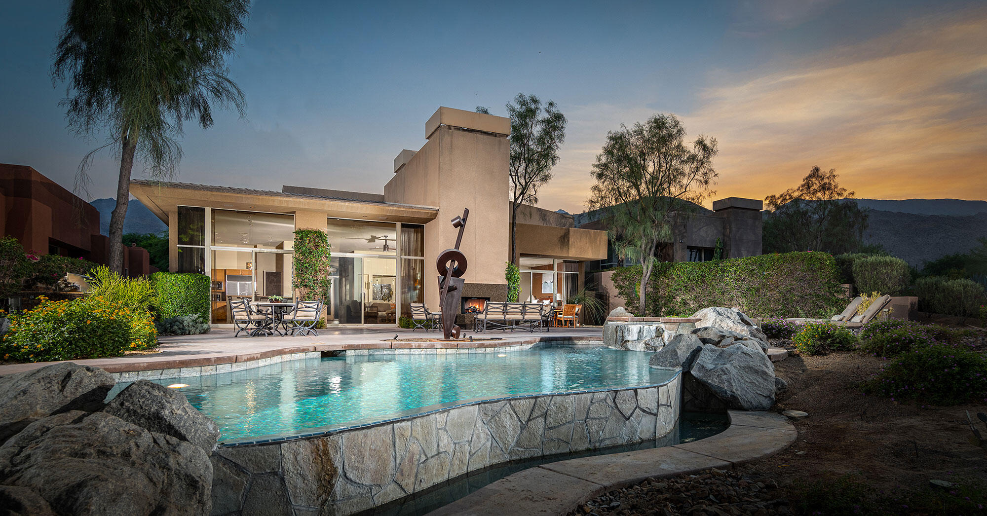 202 Wikil Place Palm Desert, CA 92260 - Photo 1 of 1 a view of house with swimming pool and a yard