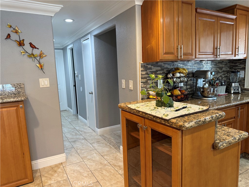20683 Waalew Road, Unit B37 Apple Valley, CA 92307 - Photo 19 of 24 a kitchen with stainless steel appliances granite countertop a sink a stove a refrigerator and cabinets