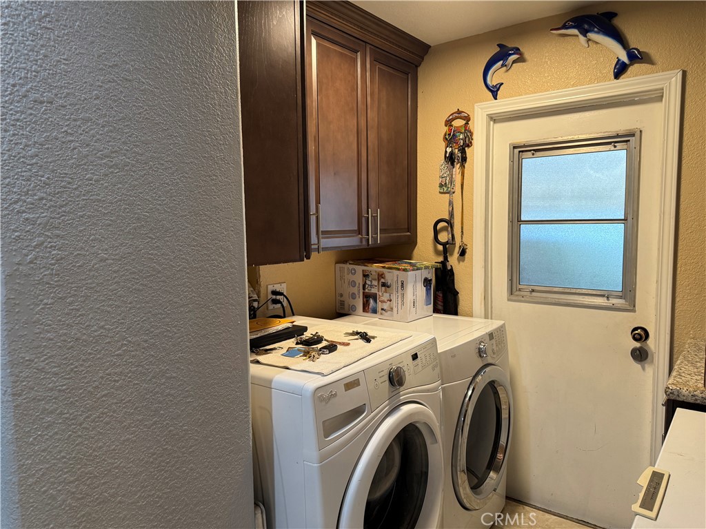 20683 Waalew Road, Unit B37 Apple Valley, CA 92307 - Photo 20 of 24 a utility room with dryer and washer