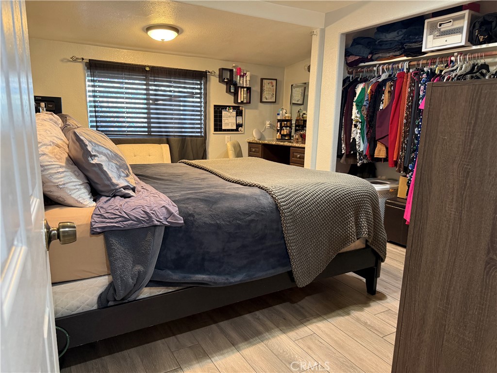 20683 Waalew Road, Unit B37 Apple Valley, CA 92307 - Photo 7 of 24 a bed sitting in a bedroom next to a window