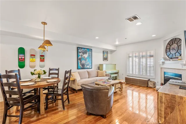a view of entryway with wooden floor and staircase