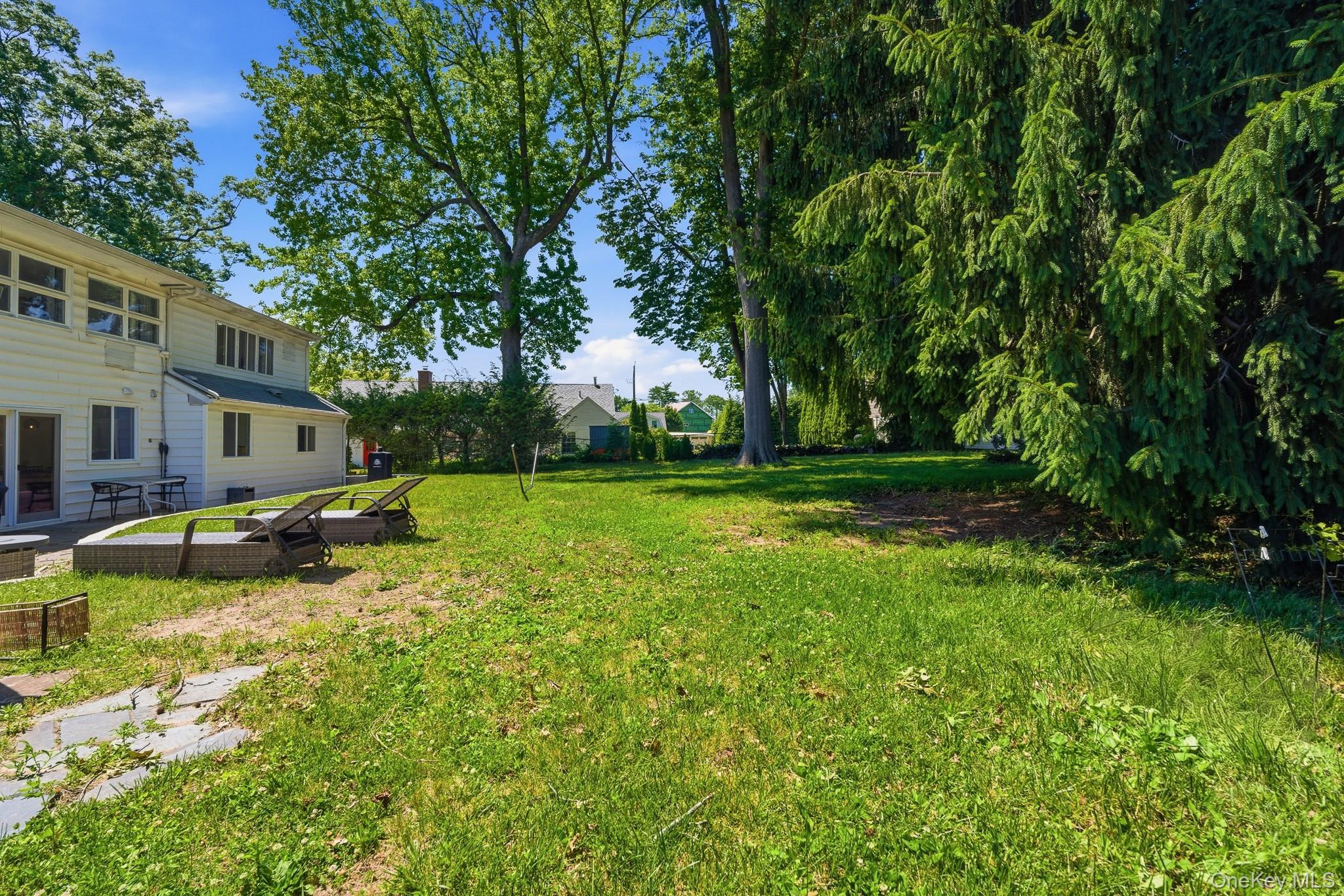 2 Bell Place Rye Brook, NY 10573 - Photo 37 of 41 Back yard with Mature Trees backs up to Crawford Park