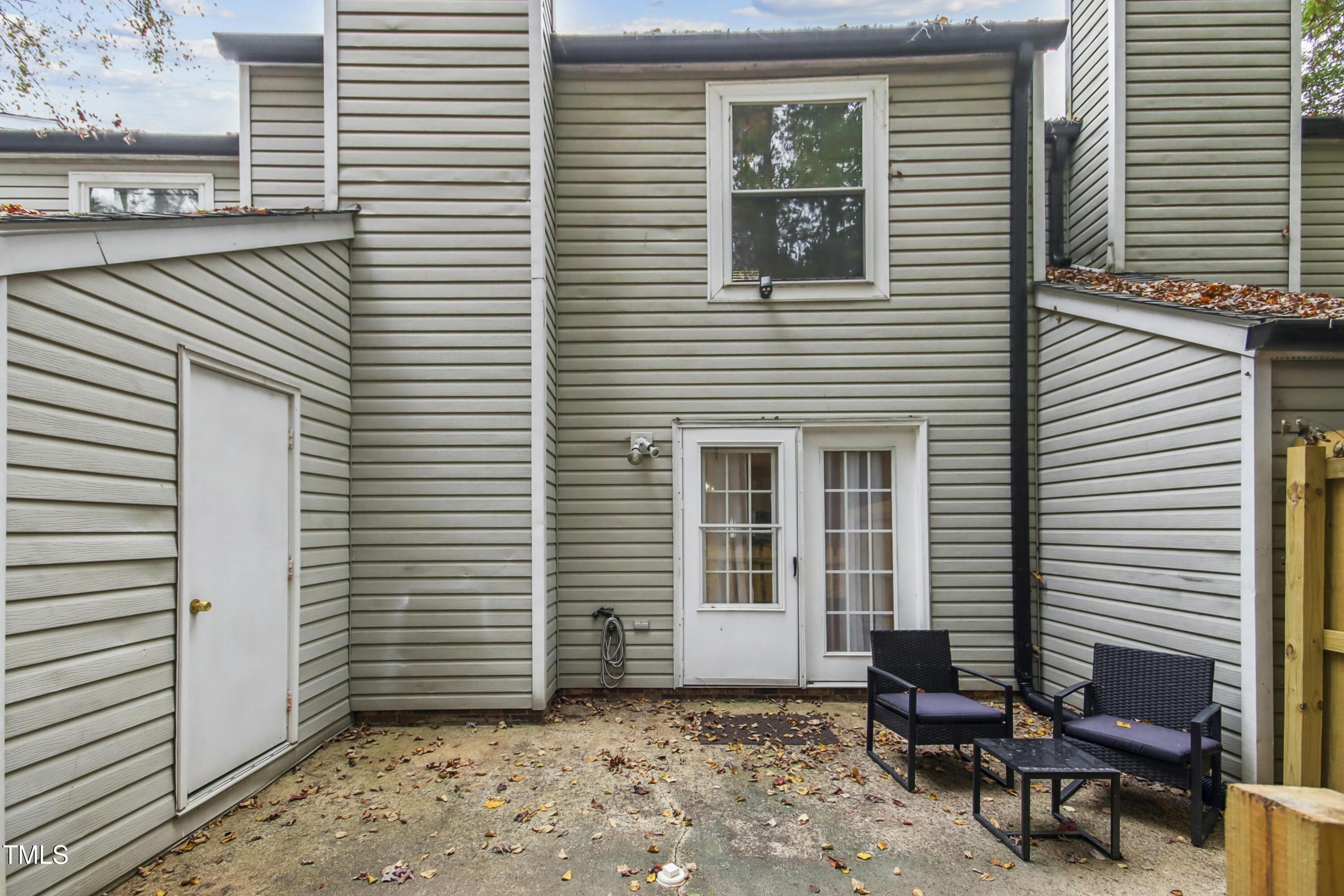 7803 Stephanie Lane Raleigh, NC 27615 - Photo 23 of 30 a view of a house with a barbeque