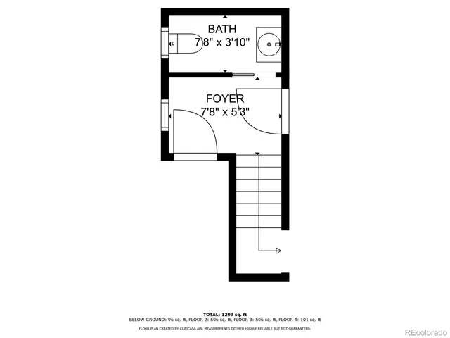 a picture of a bench in front of a wall