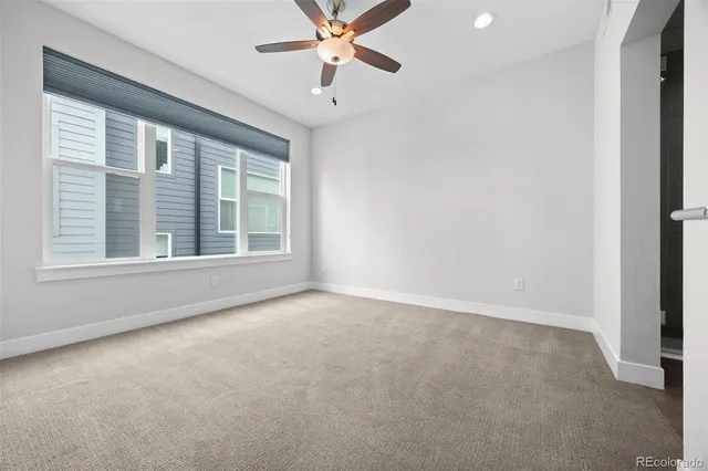 an empty room with a bathroom